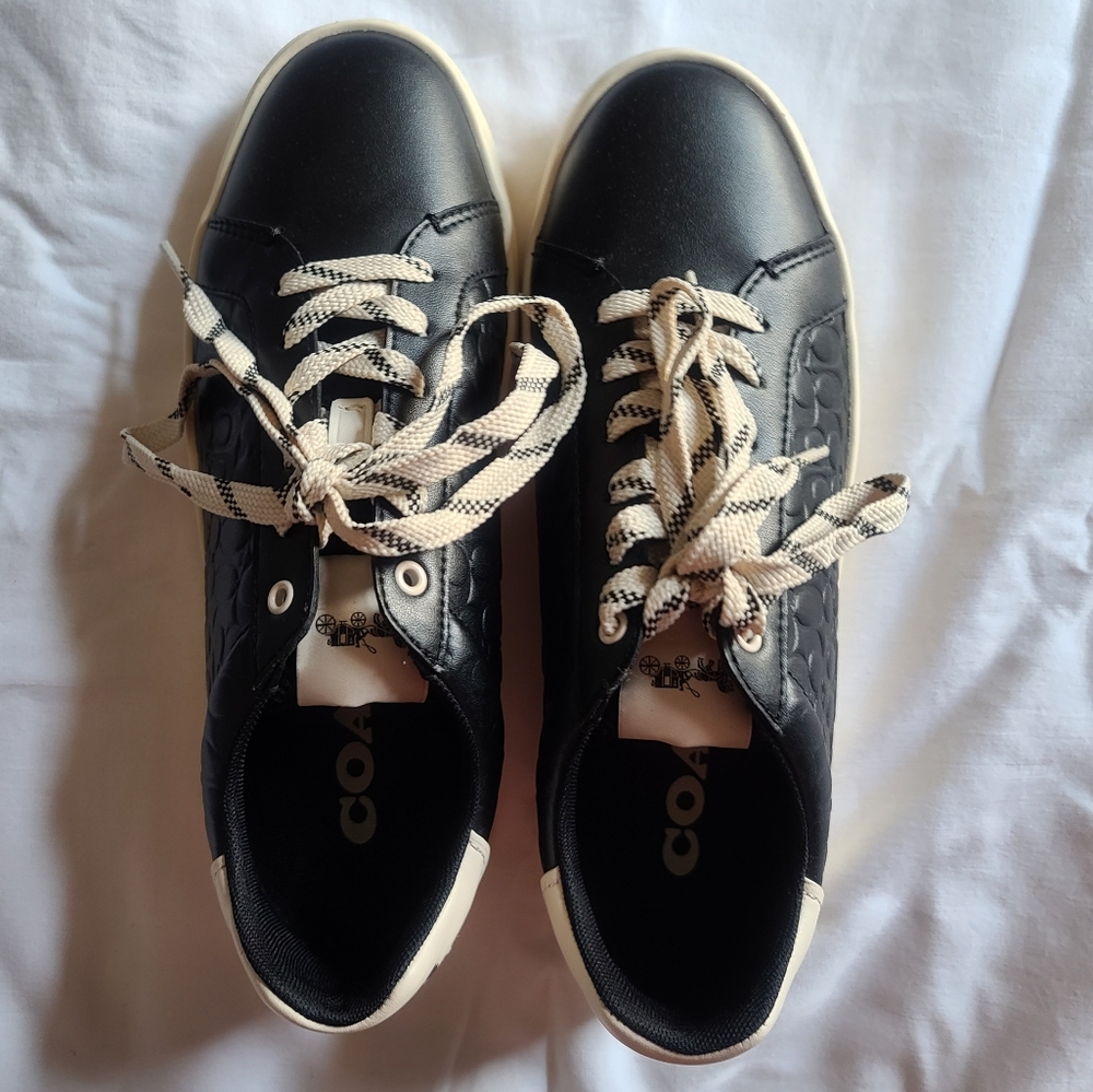 Coach logo embossed sneakers. Worn once. Size 8 Mens/9 Womens